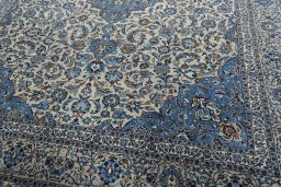 Close-up detail of 2000s Kashmar rug from Iran / Persia showing Wool weave