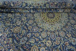 Close-up detail of 2000s Kashmar rug from Iran / Persia showing Wool weave