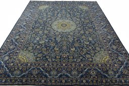 Surface texture of 2000s Kashmar rug with natural Wool and intricate pattern