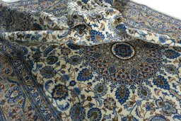 Surface texture of 2000s Kashmar rug with natural Wool and intricate pattern