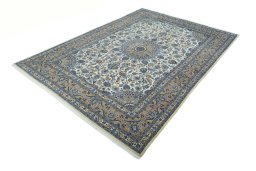 Corner detail of 2000s Kashmar rug showing border pattern and Wool pile