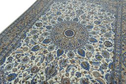 Backside of handmade 2000s Kashmar rug showing knot structure and weave density