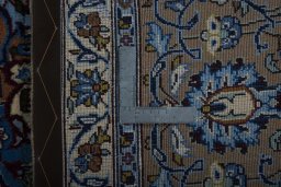 Backside of handmade 2000s Kashmar rug showing knot structure and weave density