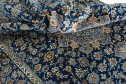 Surface texture of 2000s Kashmar rug with natural Wool and intricate pattern
