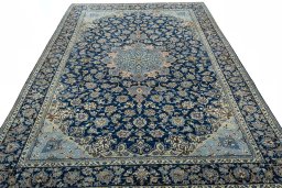 Surface texture of 2000s Kashmar rug with natural Wool and intricate pattern