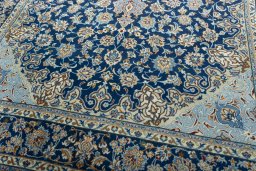 Close-up detail of 2000s Kashmar rug from Iran / Persia showing Wool weave
