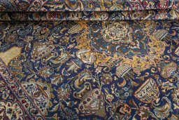 Surface texture of 2000s Kashmar rug with natural Wool and intricate pattern