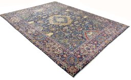Close-up detail of 2000s Kashmar rug from Iran / Persia showing Wool weave
