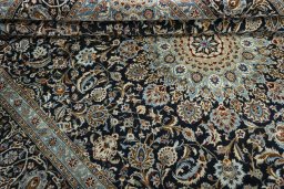 Close-up detail of 2000s Kashmar rug from Iran / Persia showing Wool weave