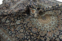 Surface texture of 2000s Kashmar rug with natural Wool and intricate pattern