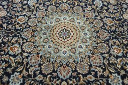 Central medallion detail of 2000s Kashmar rug from Iran / Persia
