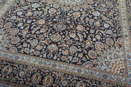 Close-up detail of 2000s Kashmar rug from Iran / Persia showing Wool weave