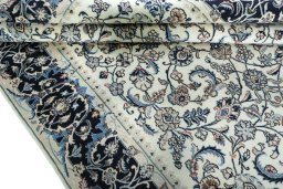 Close-up detail of 2000s Kashmar rug from Iran / Persia showing Wool weave