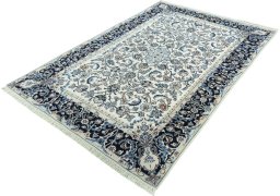 Corner detail of 2000s Kashmar rug showing border pattern and Wool pile