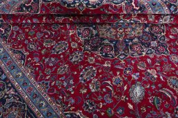 Corner detail of 2000s Kashmar rug showing border pattern and Wool pile