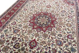 Backside of handmade 1970s Kashmar rug showing knot structure and weave density