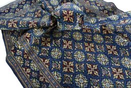Corner detail of 2000s Kashmar rug showing border pattern and Wool pile