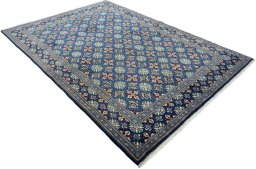 Close-up detail of 2000s Kashmar rug from Iran / Persia showing Wool weave