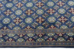 Close-up detail of 2000s Kashmar rug from Iran / Persia showing Wool weave