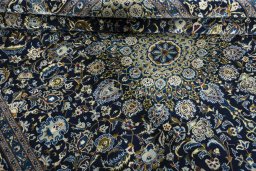 Close-up detail of 2000s Kashmar rug from Iran / Persia showing Wool weave