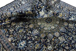 Surface texture of 2000s Kashmar rug with natural Wool and intricate pattern