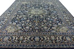 Surface texture of 2000s Kashmar rug with natural Wool and intricate pattern