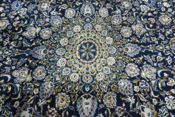 Central medallion detail of 2000s Kashmar rug from Iran / Persia