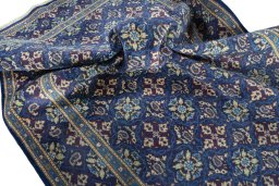 Corner detail of 2000s Kashmar rug showing border pattern and Wool pile