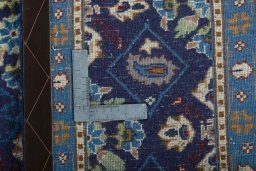 Close-up detail of 2000s Kashmar rug from Iran / Persia showing Wool weave