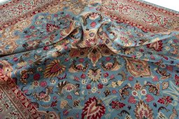 Surface texture of 1970s Kashmar rug with natural Wool and intricate pattern