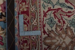 Backside of handmade 1970s Kashmar rug showing knot structure and weave density