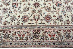 Corner detail of New Kashmar rug showing border pattern and Cork pile