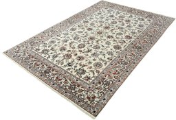 Corner detail of New Kashmar rug showing border pattern and Cork pile