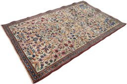Corner detail of 1990s Kashmar rug showing border pattern and Wool pile