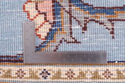 Corner detail of 1980s Kashmar rug showing border pattern and Wool pile