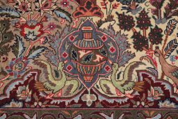 Corner detail of 1990s Kashmar rug showing border pattern and Wool pile