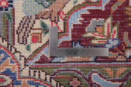 Backside of handmade 1990s Kashmar rug showing knot structure and weave density