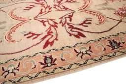Backside of handmade 2000s Kashmar rug showing knot structure and weave density
