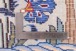 Corner detail of 2005s Kashmar rug showing border pattern and Wool pile