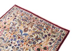 Surface texture of 2005s Kashmar rug with natural Wool and intricate pattern
