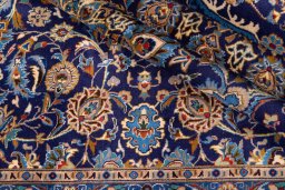 Close-up detail of 2003s Kashmar rug from Iran / Persia showing Wool weave