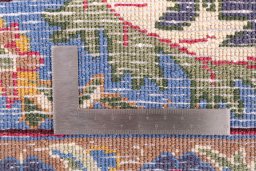 Corner detail of 1975s Kashmar rug showing border pattern and Wool pile