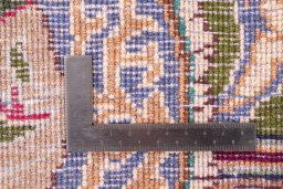 Backside of handmade 2005s Kashmar rug showing knot structure and weave density