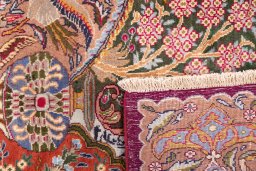 Close-up detail of 2005s Kashmar rug from Iran / Persia showing Wool weave