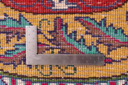 Backside of handmade 1960s Kashmar rug showing knot structure and weave density