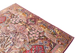 Surface texture of 1960s Kashmar rug with natural Wool and intricate pattern