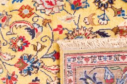 Close-up detail of 1977s Kashmar rug from Iran / Persia showing Wool weave