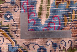 Surface texture of 2006s Kashmar rug with natural Wool and intricate pattern