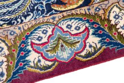 Backside of handmade 2006s Kashmar rug showing knot structure and weave density