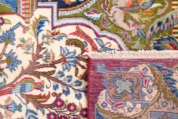 Close-up detail of 2006s Kashmar rug from Iran / Persia showing Wool weave